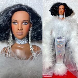 Friday Foster Basic fashion doll from Robert Tonner's 2008 Fall/Holiday collection, featuring brown eyes and dark hair.